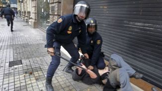 represion-contra-manifestantes-en-espana-619x348